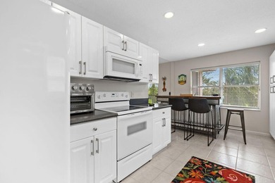 Welcome home to this beautiful 3-bedroom, 2-bath condominium - photo 25