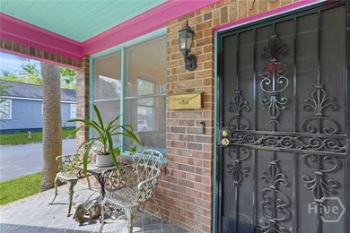 Charming Midtown brick ranch on a corner lot featuring a covered - photo 3