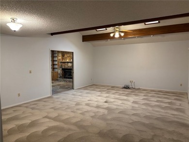 One of the largest condos in White Oak Station features a beamed - photo 5