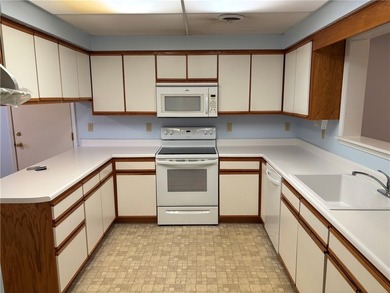 One of the largest condos in White Oak Station features a beamed - photo 7