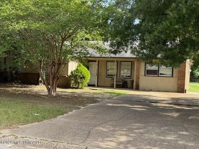 Cash-Flowing Investment on a Large Corner Lot! Situated on a - photo 1