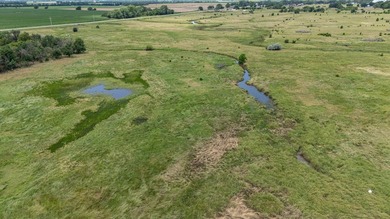 An 80.4-acre property just outside of Chase, KS, featuring a mix - photo 11