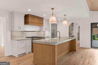 This incredible home is masterfully reimagined with intentional - photo 16