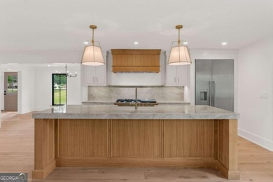 This incredible home is masterfully reimagined with intentional - photo 17