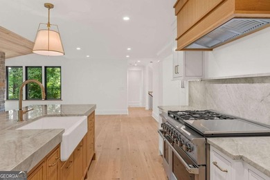 This incredible home is masterfully reimagined with intentional - photo 27