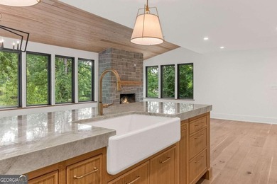 This incredible home is masterfully reimagined with intentional - photo 28