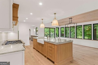 This incredible home is masterfully reimagined with intentional - photo 29