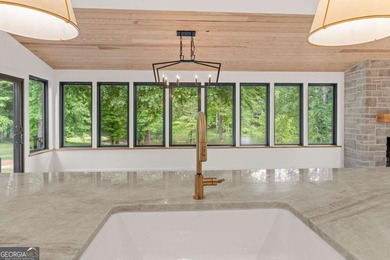 This incredible home is masterfully reimagined with intentional - photo 33