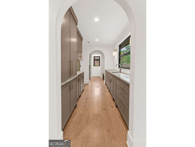 This incredible home is masterfully reimagined with intentional - photo 34