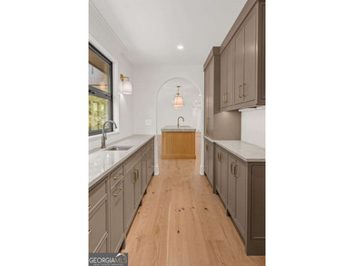 This incredible home is masterfully reimagined with intentional - photo 40