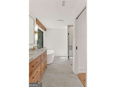 This incredible home is masterfully reimagined with intentional - photo 43