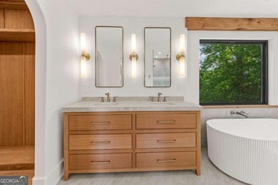 This incredible home is masterfully reimagined with intentional - photo 44