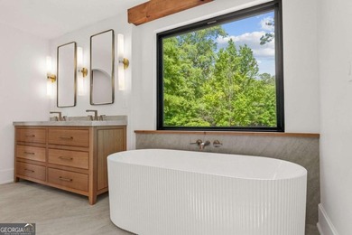This incredible home is masterfully reimagined with intentional - photo 46