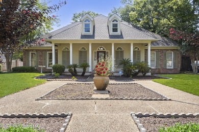 Welcome to this exceptional custom-built home nestled in the - photo 1