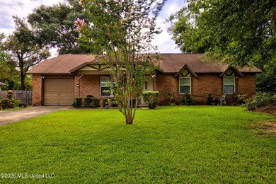 This charming all-brick 4-bedroom, 2-bath home has been lovingly - photo 1