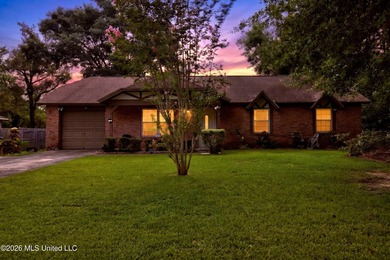 This charming all-brick 4-bedroom, 2-bath home has been lovingly - photo 2
