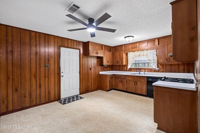 This charming all-brick 4-bedroom, 2-bath home has been lovingly - photo 9