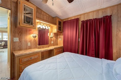 Here's another darling bungalow in the LAND OWNED community of - photo 12
