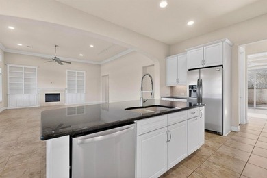 Ready to create your dream golf course retreat? This stucco and