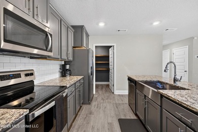 Modern design meets everyday convenience in this like-new - photo 14