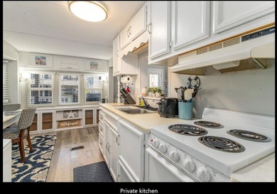 Cozy 2BR/2BA located within the prestigious and highly sought - photo 15