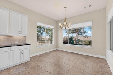 Ready to create your dream golf course retreat? This stucco and