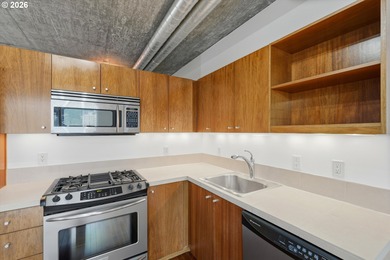 Enjoy west-facing city, sunset, and stadium views at this modern