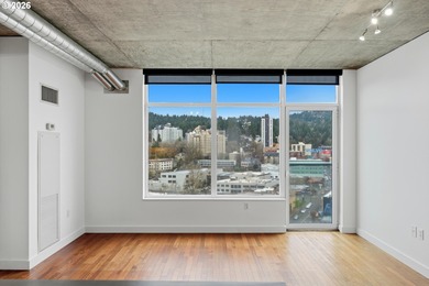 Enjoy west-facing city, sunset, and stadium views at this modern