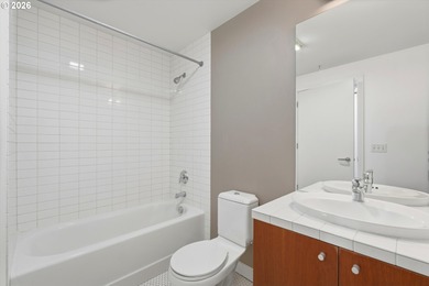 Enjoy west-facing city, sunset, and stadium views at this modern