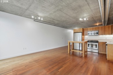 Enjoy west-facing city, sunset, and stadium views at this modern