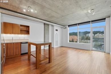 Enjoy west-facing city, sunset, and stadium views at this modern