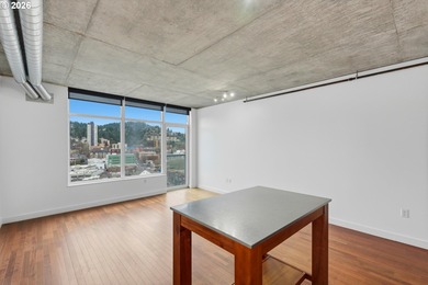 Enjoy west-facing city, sunset, and stadium views at this modern