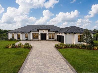Experience luxury in this exceptional custom estate on 5 private - photo 1
