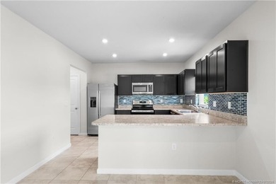 Move-in ready and beautifully maintained, this spacious - photo 9