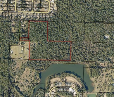 Lake Acreage For Sale in Crestview, Florida