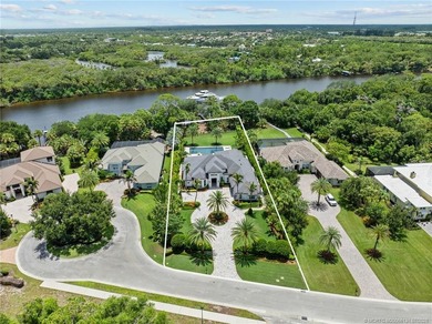 Welcome to this extraordinary waterfront estate in the gated - photo 2