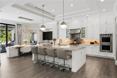 Welcome to this extraordinary waterfront estate in the gated - photo 4