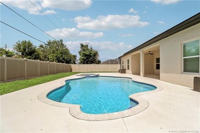 WOW!! Gorgeous custom pool home featuring 4 spacious bedrooms, 3 - photo 2