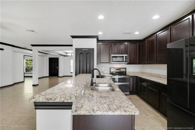 WOW!! Gorgeous custom pool home featuring 4 spacious bedrooms, 3 - photo 5