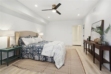 Thoughtfully renovated in 2021, this Canal Blvd residence blends - photo 15
