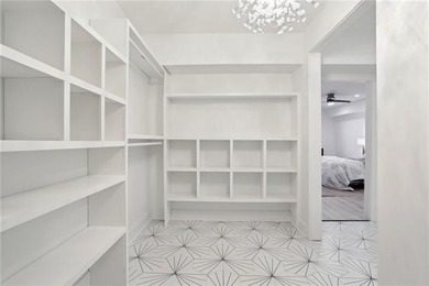 Thoughtfully renovated in 2021, this Canal Blvd residence blends - photo 17