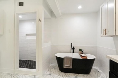 Thoughtfully renovated in 2021, this Canal Blvd residence blends - photo 19
