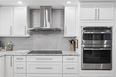 Completely updated from top to bottom with over $250,000 in - photo 9