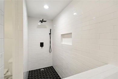 Thoughtfully renovated in 2021, this Canal Blvd residence blends - photo 20