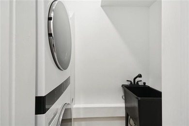 Thoughtfully renovated in 2021, this Canal Blvd residence blends - photo 21