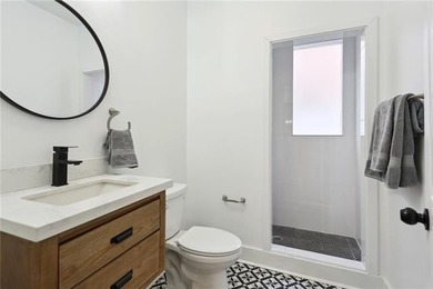 Thoughtfully renovated in 2021, this Canal Blvd residence blends - photo 23