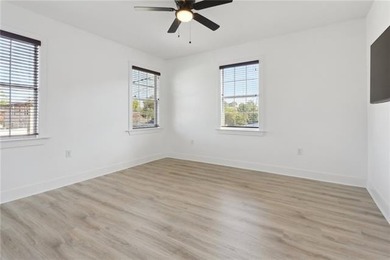 Thoughtfully renovated in 2021, this Canal Blvd residence blends - photo 24