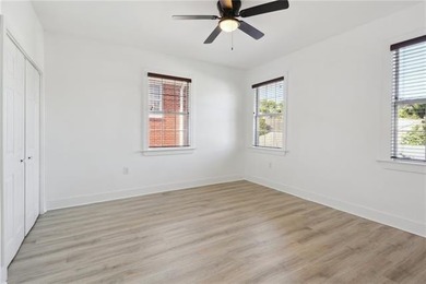 Thoughtfully renovated in 2021, this Canal Blvd residence blends - photo 26