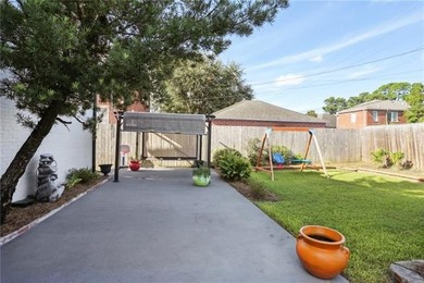 Thoughtfully renovated in 2021, this Canal Blvd residence blends - photo 28