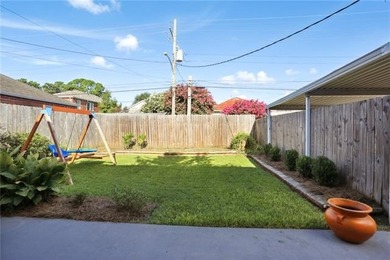 Thoughtfully renovated in 2021, this Canal Blvd residence blends - photo 29